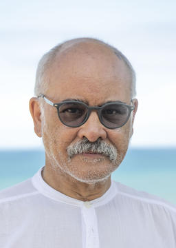 photograph of Crain Soudien in a white shirt